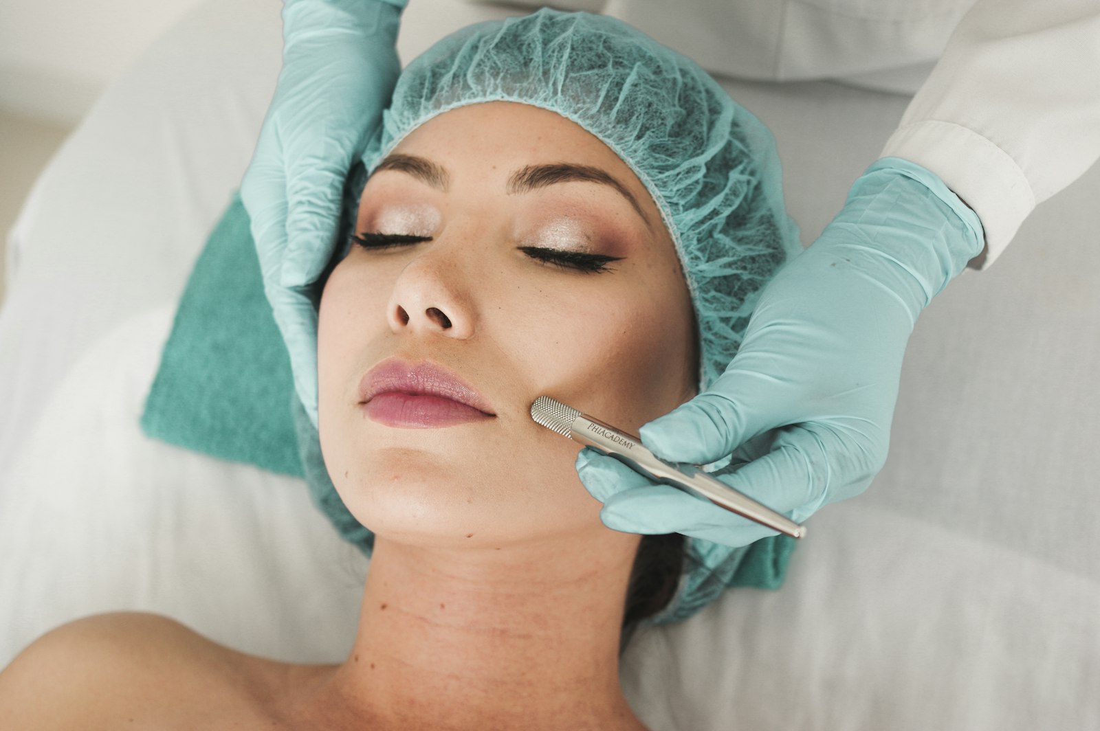 A physician assessing a patient's skin